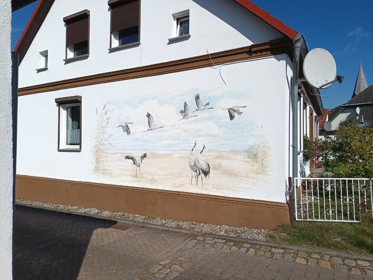 Haus Seitenansicht mit Bemalung